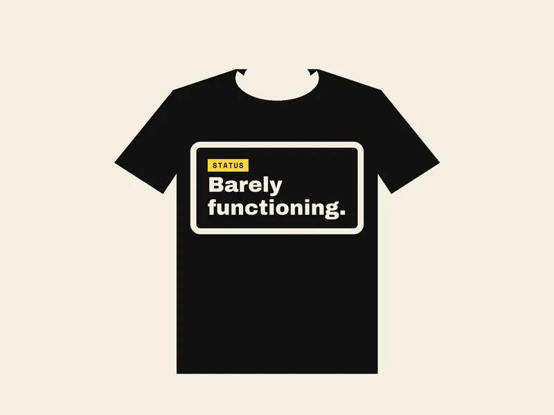 Black t-shirt with a yellow STATUS label reading: Barely functioning.